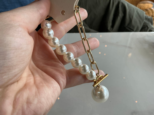 Gold chain and pearl charm bracelet