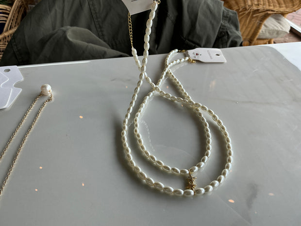 Dainty Pearl necklace with star charm